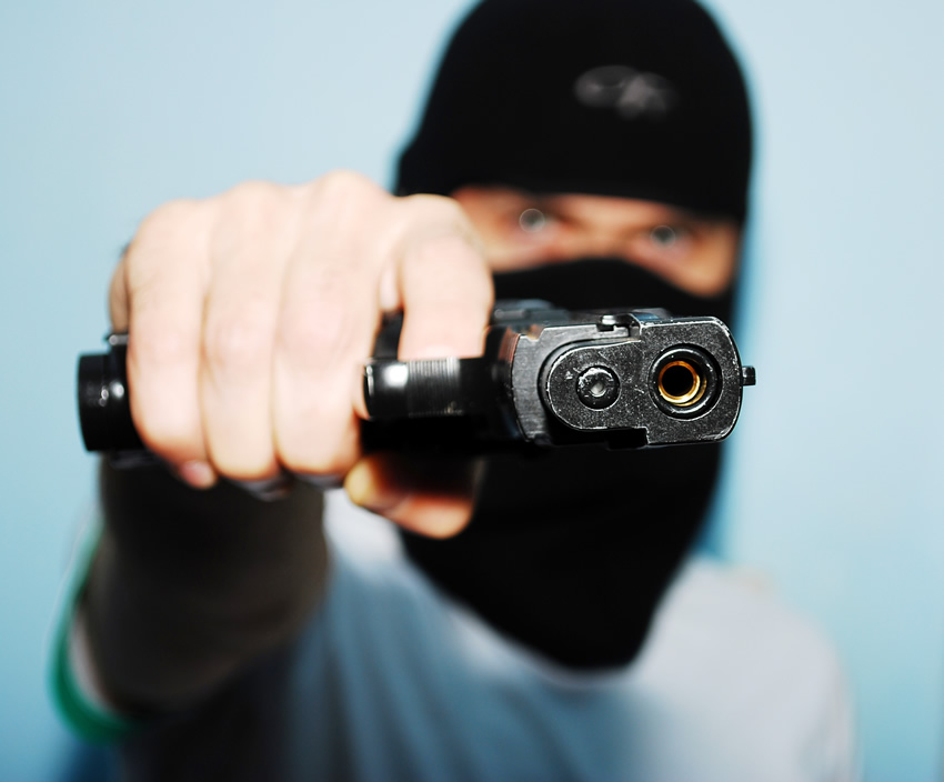 PISTOLERO ASALTANTE