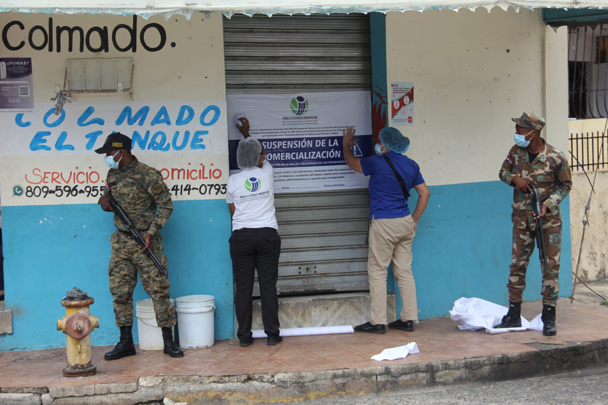 Foto Cierre De Colmado El Tanque En SDE Scaled