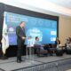 El Director Ejecutivo De Pro Consumidor Eddy Alcantara Habla En La Conferencia Con Motivo Del Dia Mundial De Los Derechos Del Consumidor.